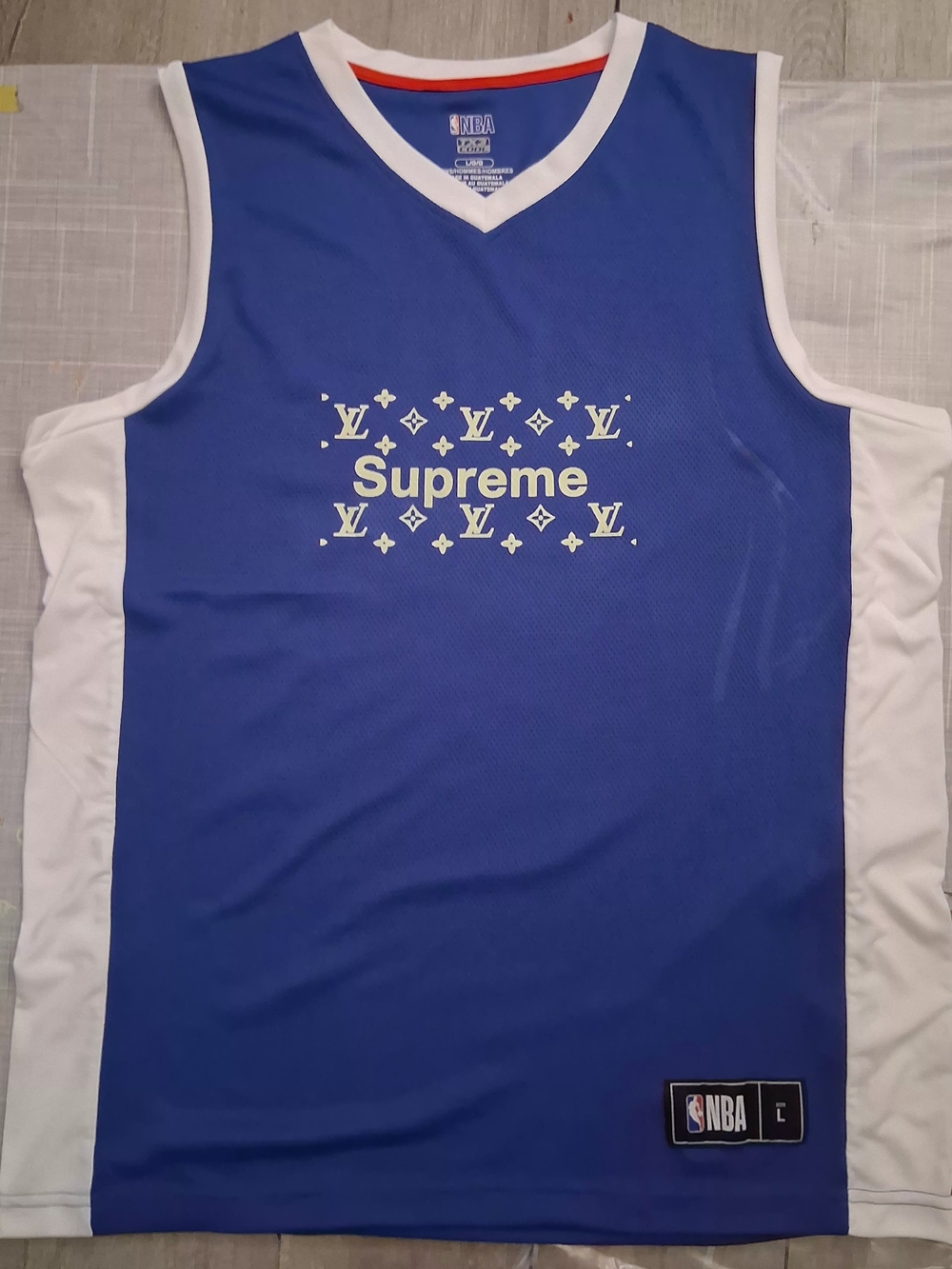GRAIL LISTING: Supreme x Louis Vuitton x Tom & Jerry Mesh Basketball Jersey-Lrge